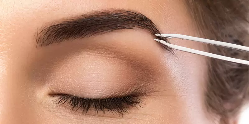Tweezers On Eyebrows